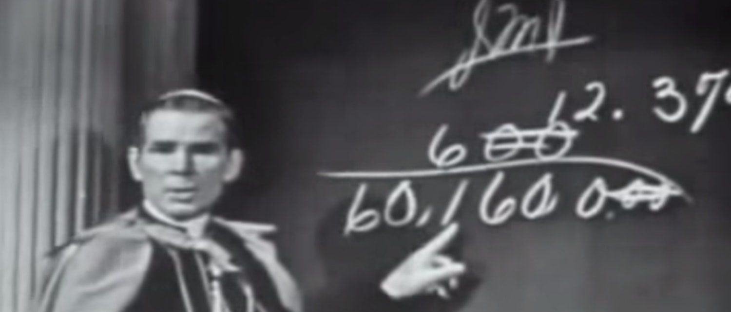 Bishop Sheen at the blackboard during Life Is Worth Living