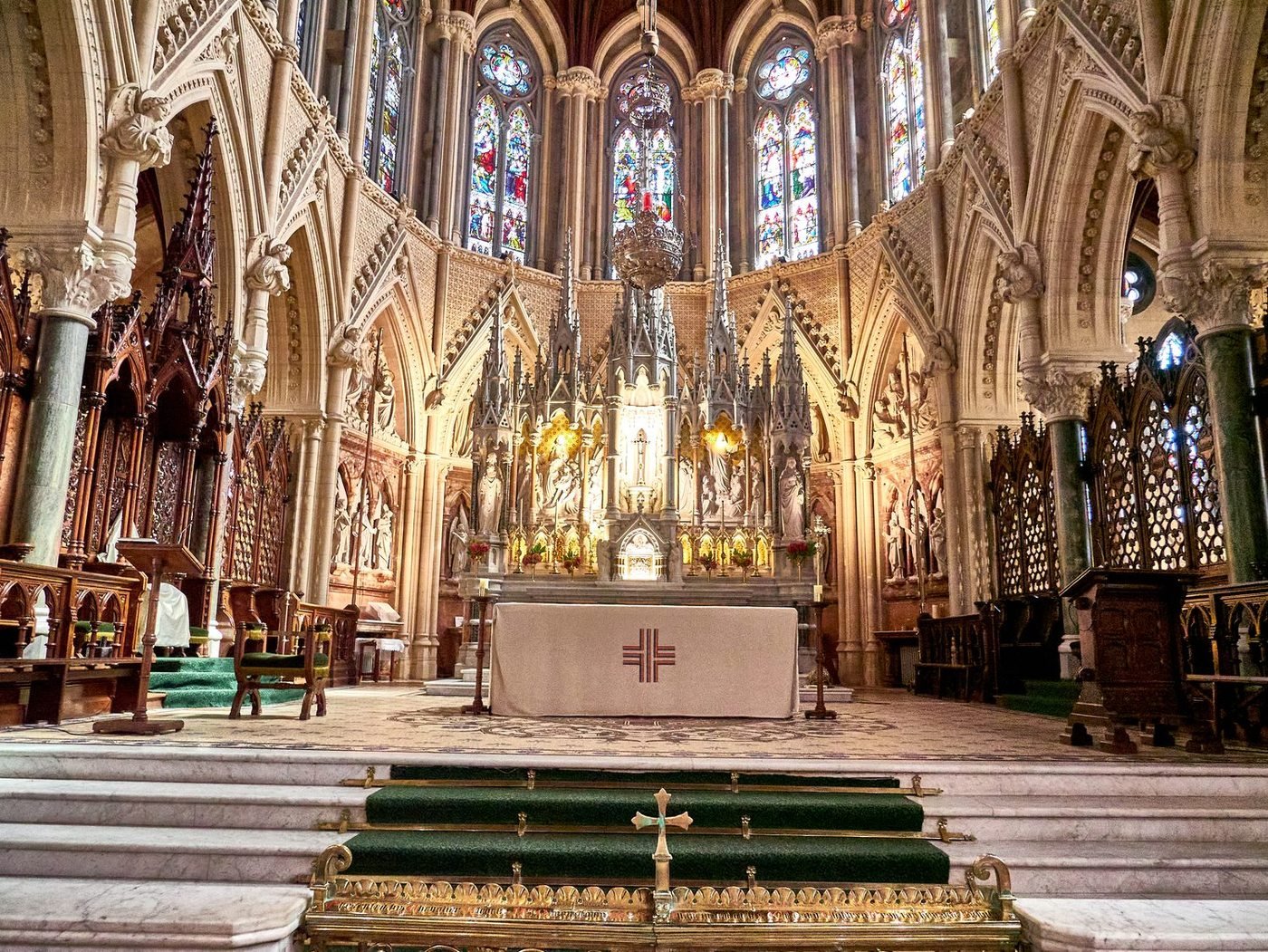 A high altar lit for prayer